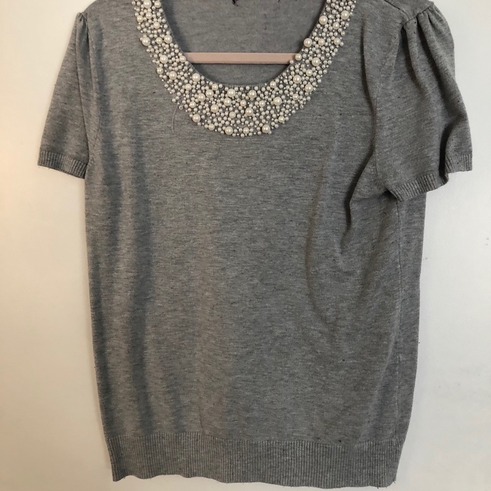 Grey sweater with pearls around collar